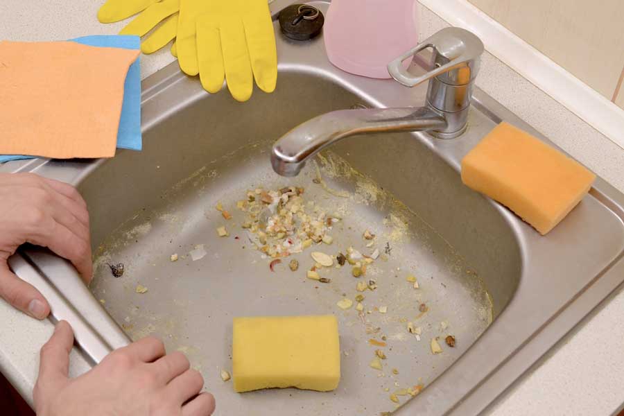 cleaning kitchen sink garbage disposal