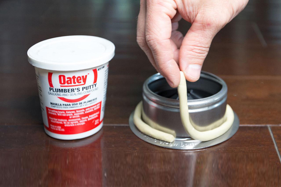 using plumbers putty on kitchen sink drain
