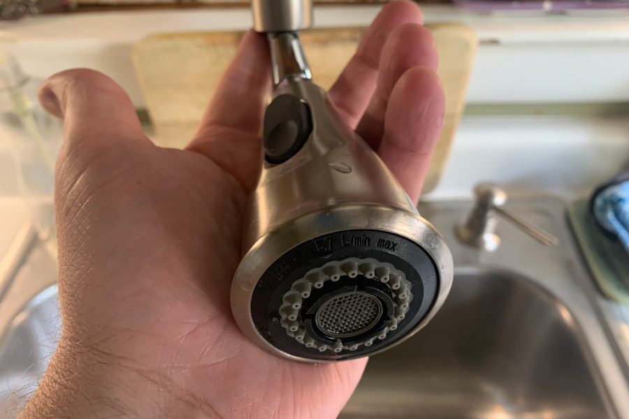 How To Unclog A Kitchen Sink Sprayer Modern Sink Sprayer In Hand 