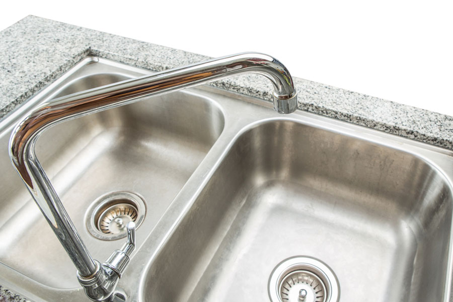 How to install a duo cup sink strainer on my sink?