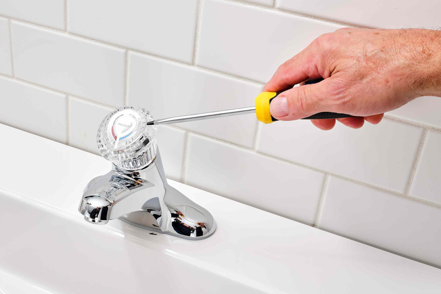 kitchen faucet handle hits wall